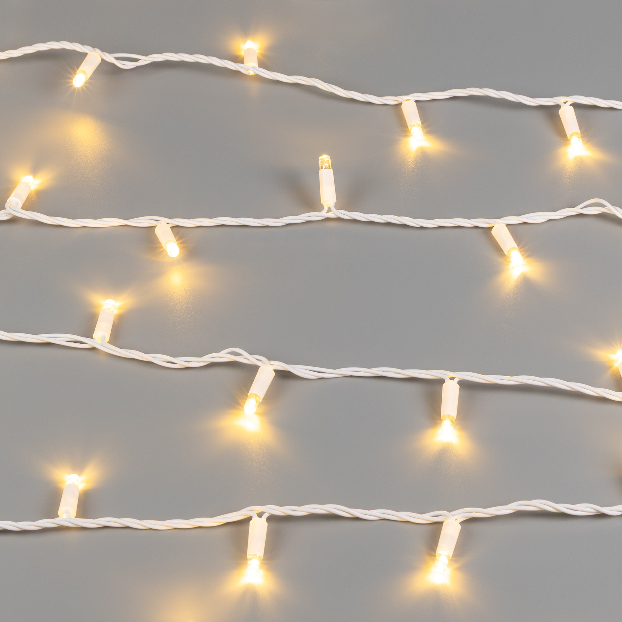 Светодиодная гирлянда ARD-STRING-CLASSIC-10000-WHITE-100LED-STD WARM (230V, 7W) (Ardecoled, IP65, 1 год)