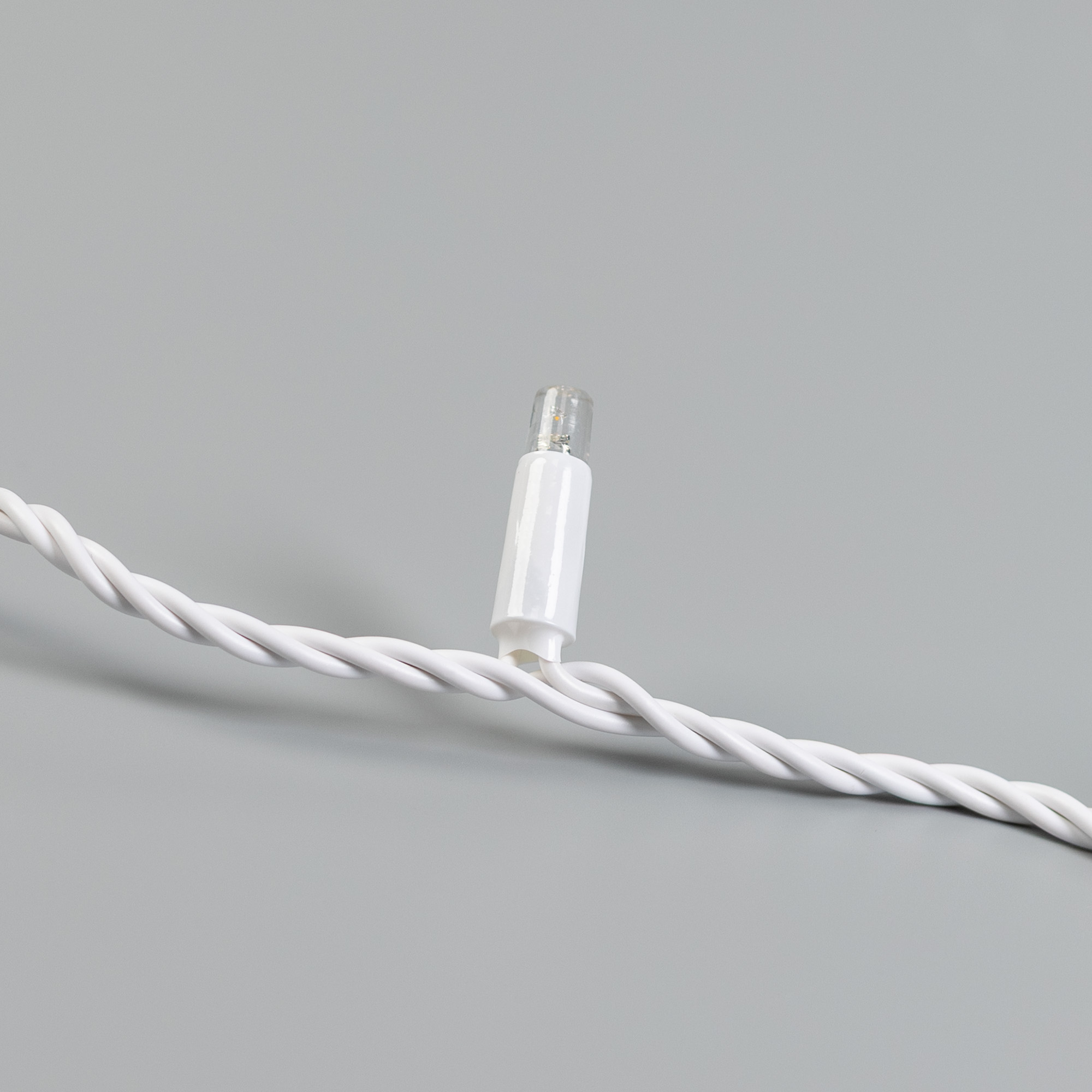 Светодиодная гирлянда ARD-STRING-PRO-10000-WHITE-100LED-STD WARM (230V, 7W) (Ardecoled, IP65, 2 года)